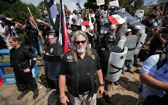 White nationalists, neo-Nazis and members of the 'alt-right' exchange insults with counter-protesters as they attempt to guard the entrance to Emancipation Park during the Unite the Right rally August 12, 2017 in Charlottesville, Virginia. (Chip Somodevilla/Getty Images/AFP)