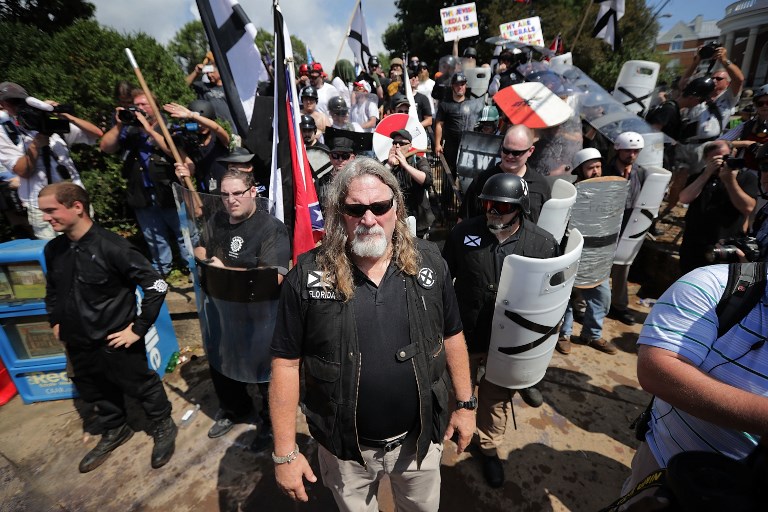 White nationalists, neo-Nazis and members of the 'alt-right' exchange insults with counter-protesters as they attempt to guard the entrance to Emancipation Park during the Unite the Right rally August 12, 2017 in Charlottesville, Virginia. (Chip Somodevilla/Getty Images/AFP)