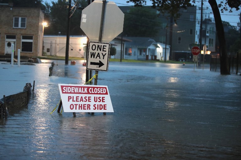 A street is covered with water after being inundated with flooding from Hurricane Harvey on August 27, 2017 in Houston, Texas. (Scott Olson/Getty Images/AFP)