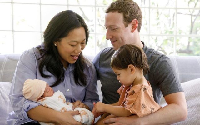 Mark Zuckerberg, right, with his wife Dr. Priscilla Chan. and their two children, Maxima and August. (Courtesy/ Facebook)