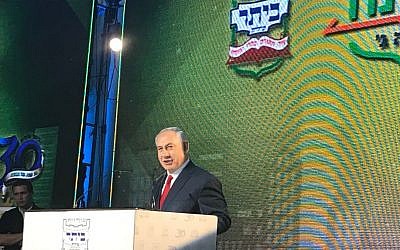 Prime Minister Benjamin Netanyahu speaks at a ceremony inaugurating a new neighborhood in the Beitar Illit settlement on August 3, 2017. (Jacob Magid/Times of Israel)