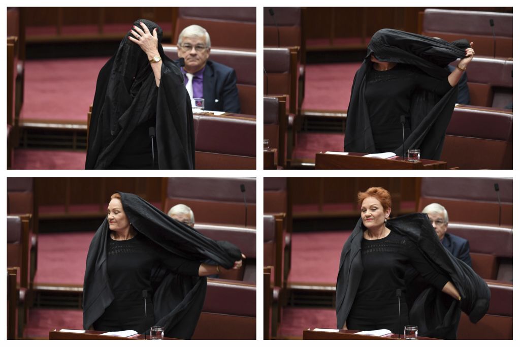 Senator Pauline Hanson wears a burqa during question time in the Senate chamber at Parliament House in Canberra, Australia, Thursday, Aug. 17, 2017. (Jed Cooper/Australian Broadcasting Corp. via AP)