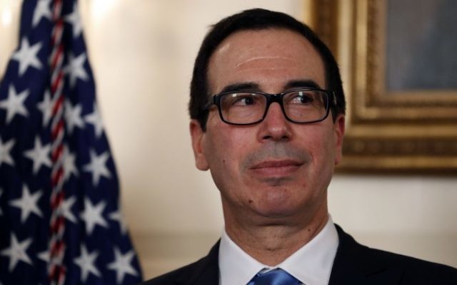 Treasury Secretary Steve Mnuchin stands in the Diplomatic Reception Room of the White House in Washington, Monday, Aug. 14, 2017, during an event for President Donald Trump to sign a memorandum calling for a trade investigation of China. (AP Photo/Alex Brandon)