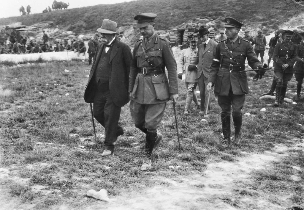 French prime minister M. Georges Benjamin Clemenceau on his only visit to the Australian front, walking with Major General E. G. Sinclair-MacLagan and Lieutenant General Sir John Monash (right, foreground). At far right is Lieutenant Colonel J. D. Lavarack. (Courtesy of the Australian War Memorial)