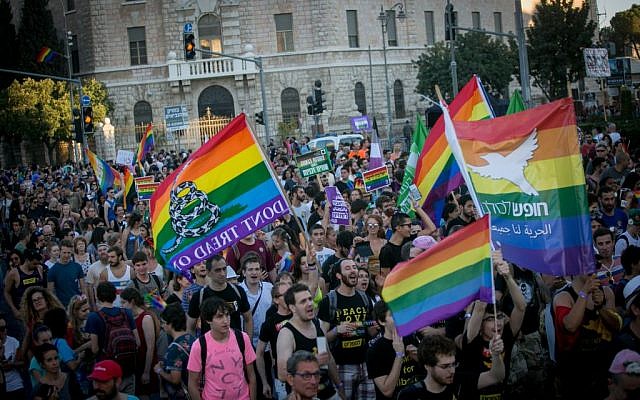 People participate in the annual Gay Pride parade in central Jerusalem, under heavy security on August 3, 2017. (Miriam Alster/Flash90)