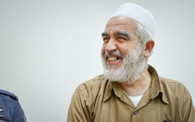 Leader of the northern branch of the Islamic Movement in Israel, Sheikh Raed Salah, arrives to the Rishon Lezion Magistrate's Court on August 15, 2017. (Avi Dishi/Flash90)