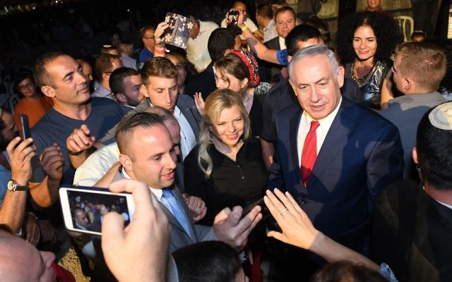 Prime Minister Benjamin Netanyahu and his wife Sara attend an event marking 50 years of Israeli settlements in Samaria, in Barkan, in the West Bank, on August 28, 2017. (Kobi Gideon/GPO)