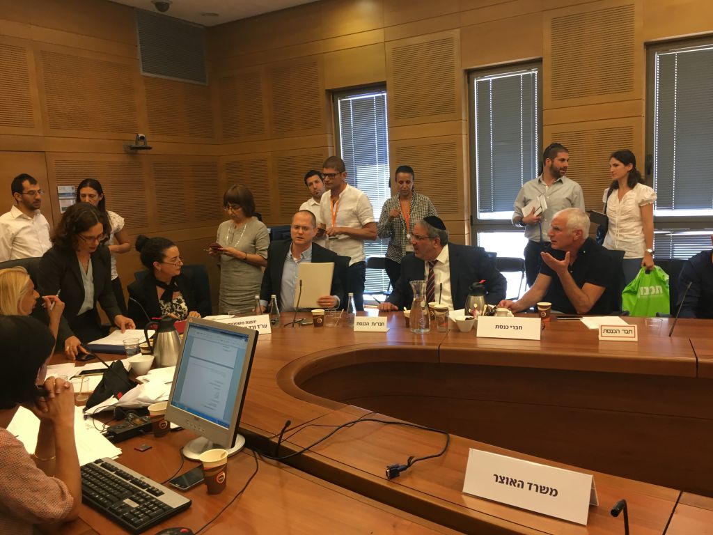 MKs Oded Forer (Israel Beitenu), Yigal Guetta (Shas) and Haim Jelin (Yesh Atid) at a meeting of the Knesset committee meeting on the law to ban binary options. August 7, 2017 (Photo by The Times of Israel)