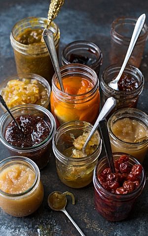 An assortment of preserves from 'The Joys of Jewish Preserving,' by Emily Paster. (Courtesy)