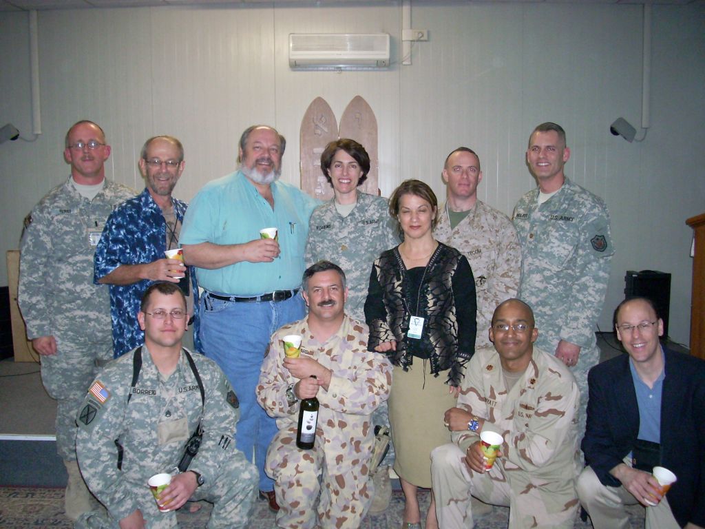 Major Scott Leonard and other Jewish ANZAC soldiers enjoying some Five Stones kosher wine from Australia at a Friday night service in early 2008. MAJ Stuart Wolfer, back right, was killed in action on April 6 of that year. (Courtesy Scott Leonard)
