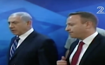 Ari Harow with Prime Minister Benjamin Netanyahu (Channel 2 screenshot)