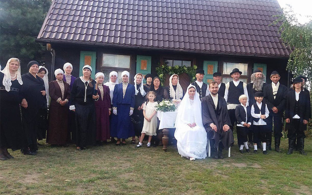 Villagers attending a fake Jewish wedding in the Polish village of Radzanow, August 5, 2017. (Jonny Daniels/From the Depths/via JTA)