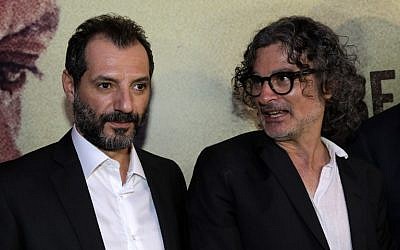 Lebanese-French director Ziad Douieri (R) poses with actor Adel Karam at the pre-screening of "The Insult" in Beirut on September 12, 2017.  (AFP PHOTO / ANWAR AMRO)