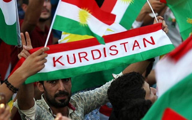 Iraqi Kurds fly Kurdish flags during an event to urge people to vote in the upcoming independence referendum in Irbil, the capital of the autonomous Kurdish region of northern Iraq, on September 16, 2017. (AFP/Safin Hamed)