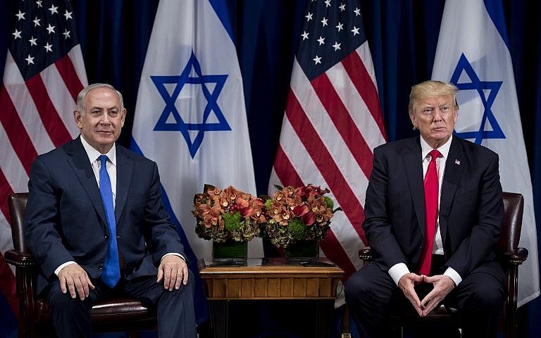 Prime Minister Benjamin Netanyahu (L) and US President Donald Trump are seen prior to their meeting at the Palace Hotel in New York City ahead of the United Nations General Assembly on September 18, 2017.(AFP Photo/Brendan Smialowski)