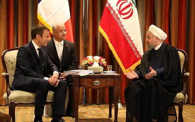 France’s President Emmanuel Macron (L) meets with his Iranian counterpart Hassan Rouhani (R) in New York on September 18, 2017, as world leaders gathered in the United States for the UN General Assembly. (AFP PHOTO / LUDOVIC MARIN)