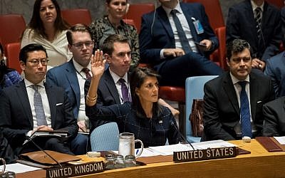 United States ambassador to the United Nations Nikki Haley, center, raises her hand as she votes yes to levy new sanctions on North Korea during a meeting of the United Nations Security Council concerning North Korea at UN headquarters, in New York City, September 11, 2017. (Drew Angerer/Getty Images/AFP)