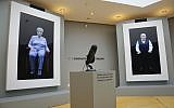 Holocaust survivors Eva Schloss, left, Anne Frank's posthumous stepsister when her mother married Frank's father, and fellow survivor Pinchas Gutter are displayed as part of an exhibit at the Museum of Jewish Heritage called 'New Dimensions in Testimony,' in New York, September 15, 2017. (AP Photo/Bebeto Matthews)