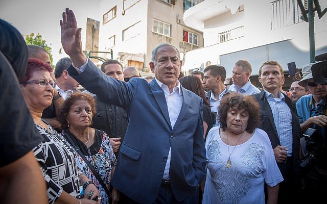 Prime Minister Benjamin Netanyahu meets with residents of South Tel Aviv, during a tour in the neighborhood  on August 31, 2017. (Miriam Alster/Flash90)
