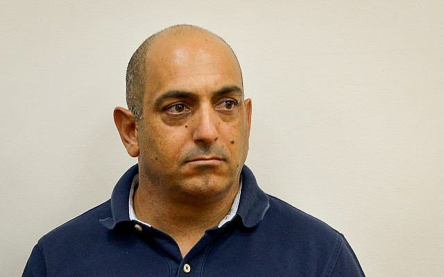 David Sharan is seen during a remand hearing at the Rishon Lezion Magistrate's Court, September 3, 2017. (Flash90)
