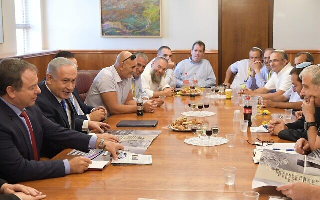 Prime Minister Benjamin Netanyahu meets with Yesha Council leaders at the Prime Minister's Office in Jerusalem on September 27, 2017. (Amos Ben Gershom/GPO)
