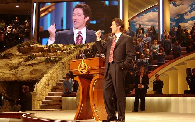 Joel Osteen, pastor of the nation's largest megachurch, preaches at Lakewood Church in Houston, Texas, where services are broadcast around the world. (Frank E. Lockwood/Lexington Herald-Leader/MCT)