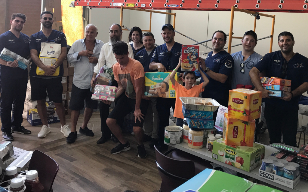 Eli Rowe's team of 12 delivered supplies to the San Juan Chabad, as well as to vulnerable areas throughout Puerto Rico's capital, September 25, 2017. (Courtesy of Rowe/via JTA)