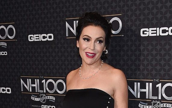 Actress Alyssa Milano at a red carpet event in Los Angeles, California, on January 27, 2017. (AFP Photo/Chris Delmas)