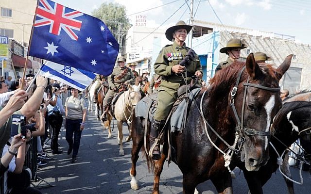Members of the Australian Light Horse association ride through Beersheba, in the northern Israeli desert, on October 31, 2017, ahead of a reenactment of the historical fight of the ANZAC (Australian and New Zealand Mounted Division) where forces captured the city from the Ottoman Empire during the First World War. (AFP PHOTO / Menahem KAHANA)