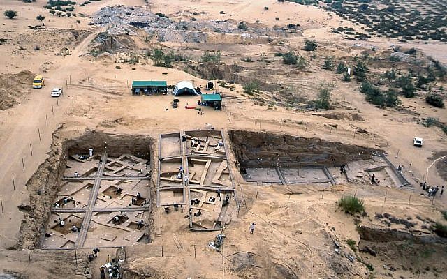 In this undated image taken in 2000, provided by the Palestinian Department of Antiquities, an aerial view of the excavations at Tel Es-Sakan, shows houses dating to 2600-2300 B.C., left, and fortifications from the late fourth millennium B.C, south of Gaza City. (Pierre de Miroschedji/Palestinian Department of Antiquities, via AP)