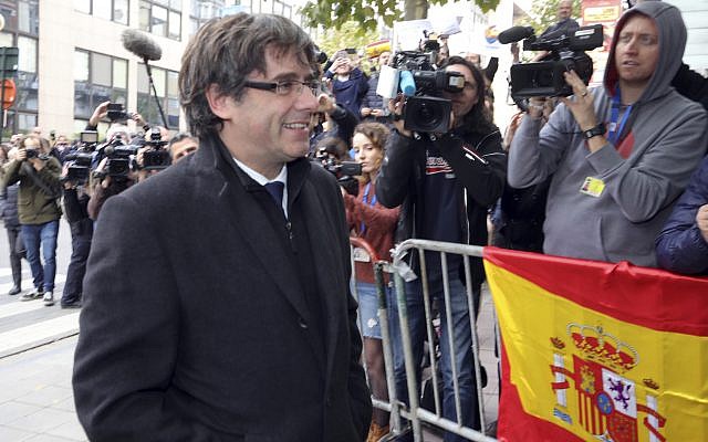 Sacked Catalonian President Carles Puigdemont arrives for a press conference in Brussels, October 31, 2017. (AP/Olivier Matthys)