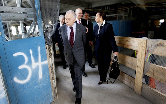 Conde Nast chairman, Si Newhouse Jr., leaves a news conference on the 34th floor of 1 World Trade Center, May 25, 2011, in New York. (AP Photo/Mary Altaffer)