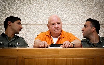 Zvi Gur (c), serving a life sentence for the murder of Oron Yarden, in the Supreme Court on July 6, 2009. (Miriam Alster/Flash90)