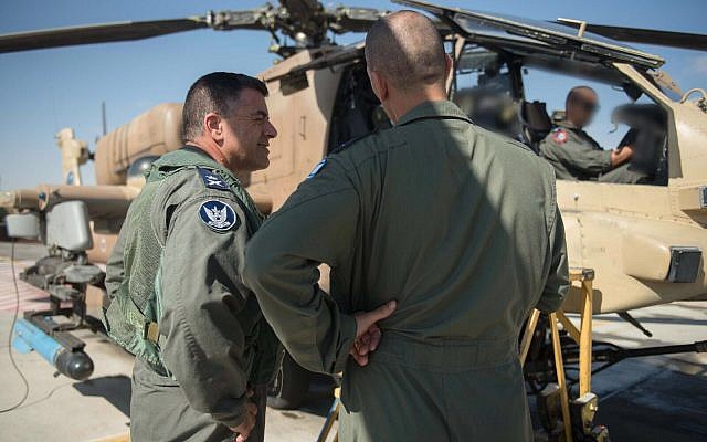 Israeli Air Force chief Maj. Gen. Amikam Norkin takes part in a training flight of the Apache helicopters, which returned to operability on October 22, 2017, after two months of being grounded following a fatal crash. (Israel Defense Forces)