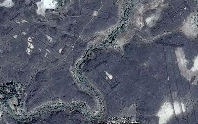 Google Earth images of "gates" visible only from the air that may be thousands of years old in the Saudi desert near Medina. (Google Earth)
