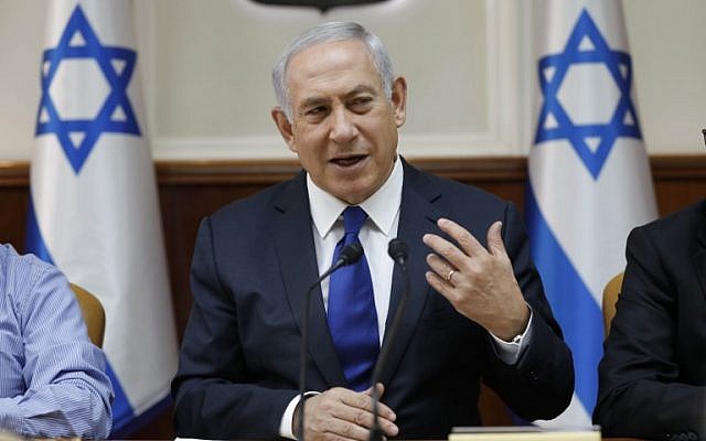 Prime Minister Benjamin Netanyahu attends the weekly cabinet meeting at his office in Jerusalem, November 12, 2017. (AFP/Pool/Abir Sultan)