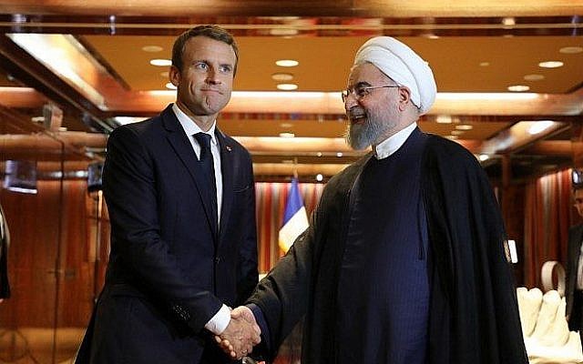 France's President Emmanuel Macron, left, meets his Iranian counterpart Hassan Rouhani in New York, September 19, 2017. (AFP Photo/ Ludovic Marin)