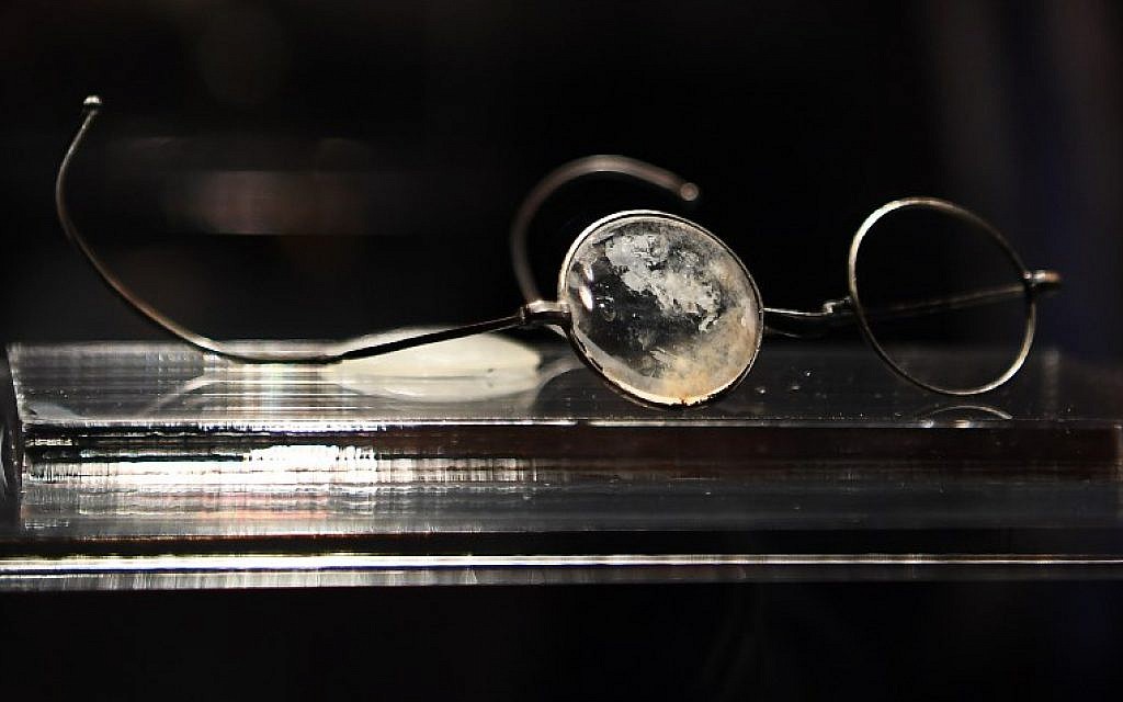 Glasses are displayed at the exhibition 'Auschwitz. Not long ago. Not far away' on November 28, 2017 at the Arte Canal Exhibition Centre in Madrid. (AFP PHOTO / GABRIEL BOUYS