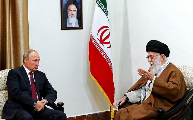 In this picture released by the office of Ayatollah Ali Khamenei, right, speaks with Russian President Vladimir Putin during their meeting in Tehran, Nov. 1, 2017. (Office of the Iranian Supreme Leader via AP)