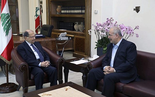 In this photo released by the Lebanese Government, Lebanese President Michel Aoun, left, meets with the head of Hezbollah's parliamentary bloc Mohammed Raad, at the Presidential Palace in Baabda, east of Beirut, Lebanon, November 27, 2017. (Dalati Nohra/Lebanese Government via AP)