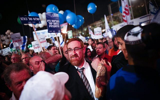 Likud MK Yehuda Glick attends a rally marking 22 years since the assassination of prime Minister Yitzhak Rabin, at Tel Aviv's Rabin Square on November 4, 2017. (Miriam Alster/Flash90)