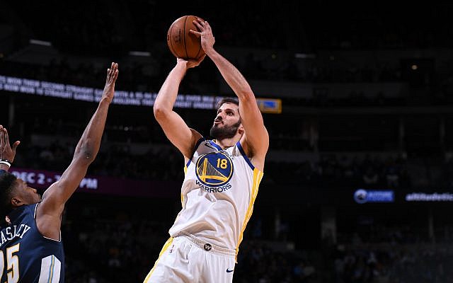 Omri Casspi #18 of the Golden State Warriors shoots the ball against the Denver Nuggets on November 4, 2017 at the Pepsi Center in Denver, Colorado. (Courtesy Golden State Warriors; Photo by Garrett Ellwood/NBAE via Getty Images)