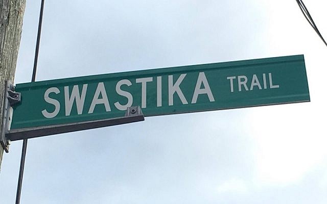 The 'Swastika Trail' street sign hanging in Puslinch Township, Canada. (Screen capture/YouTube via JTA)