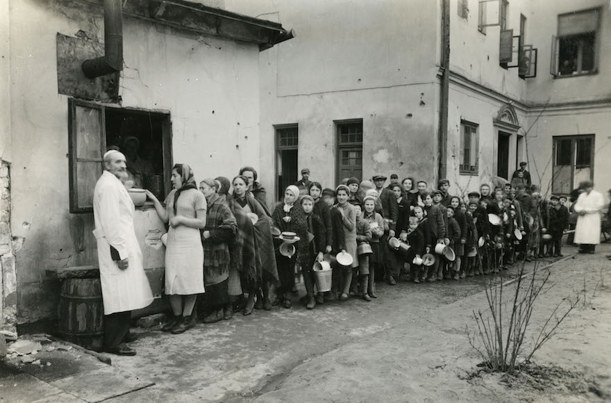 Illustrative: Jews are seen lining up in the Warsaw Ghetto during World War II. (Courtesy of American Jewish Joint Distribution Committee Archives via JTA)