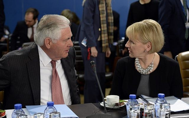 Swedish Foreign Minister Margot Wallstrom, right, speaks with US Secretary of State Rex Tillerson before a NATO Foreign Affairs Ministers' meeting held at NATO headquarter in Brussels, December 5, 2017.  (THIERRY CHARLIER/AFP)