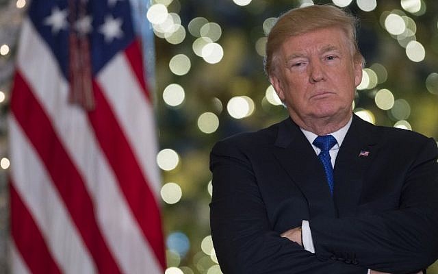 Then-US president Donald Trump speaks about the tax reform legislation in the Grand Foyer of the White House in Washington, DC, December 13, 2017. (AFP/Saul Loeb)