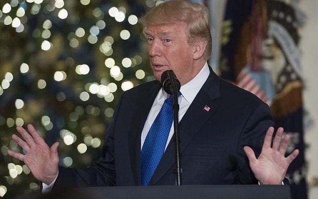 US President Donald Trump speaks about tax reform legislation in the Grand Foyer of the White House in Washington, DC, December 13, 2017. (AFP/Saul Loeb)