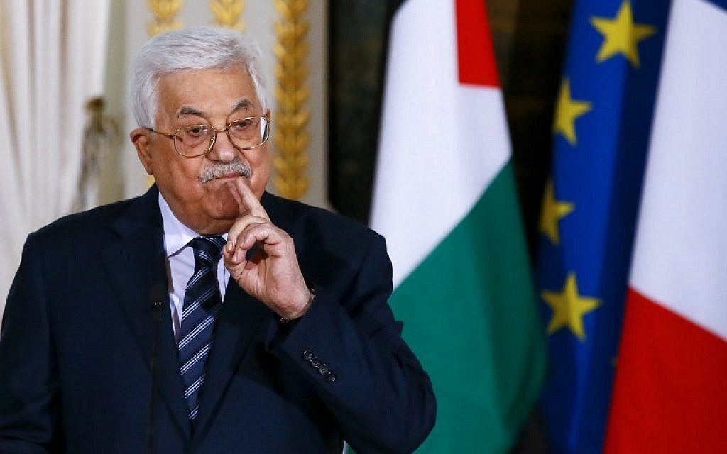Palestinian Authority President Mahmoud Abbas gestures during a press conference with the French president, following a  meeting at the Elysee presidential palace in Paris on December 22, 2017. (AFP Photo/Pool/Francois Mori)