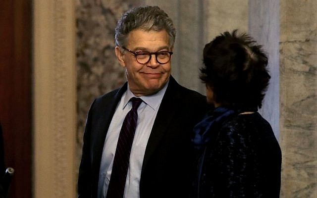 Sen. Al Franken (D-MN) looks at his wife Franni Bryson, before walking to the Senate chamber to announce his resignation on December 7, 2017 on Capitol Hill. (Mark Wilson/Getty Images/AFP)