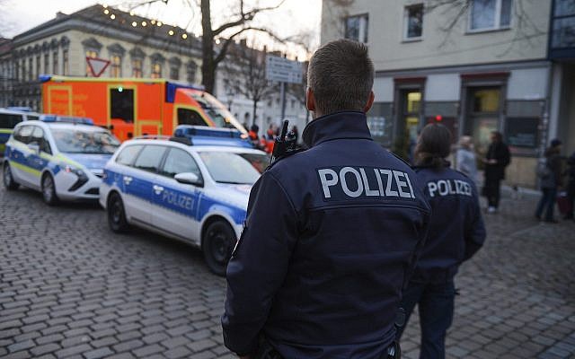 Illustrative: Police close the streets around a Christmas market after a suspicious object was found in Potsdam, Germany, on Dec. 1, 2017. (Julian Staehle/dpa via AP)